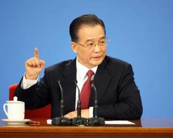 Chinese Premier Wen Jiabao gestures during a press conference after the closing meeting of the Second Session of the 11th National People's Congress (NPC) at the Great Hall of the People in Beijing, capital of China, March 13, 2009. The annual NPC session closed on Friday. (Xinhua Photo)