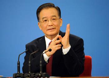 Chinese Premier Wen Jiabao answers questions during a press conference after the closing meeting of the Second Session of the 11th National People's Congress (NPC) at the Great Hall of the People in Beijing, capital of China, March 13, 2009. The annual NPC session closed on Friday.(Xinhua Photo)