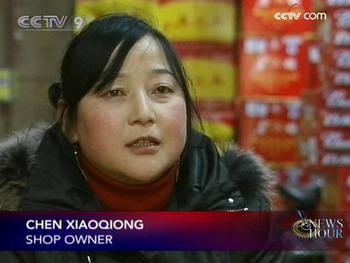 For owner Chen Xiaoqiong, it’s a reminder of the looting exactly a year ago, when she and seven of her assistants narrowly escaped falling into the hands of rioters. (CCTV.com)