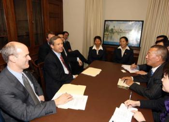 Shingtsa Tenzinchodrak (R), a living Buddha of the Kagyu sect of the Tibetan Buddhism and vice chairman of the Standing Committee of the People's Congress of Tibet Autonomous Region of China, meets with Mark Kirk (L2) and Rick Larsen (L1), co-chairmen of the U.S.-China Working Group in the House, in Washington, the United States, March 17, 2009. Mark Kirk and Rick Larsen, co-chairmen of the U.S.-China Working Group, met here on Tuesday with a five-member delegation of Tibetan deputies of China's National People's Congress, led by Shingtsa Tenzinchodrak. (Xinhua Photo)