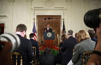 US President Barack Obama speaks during a prime time news conference in the East Room of the White House in Washington, March 24, 2009. [Agencies]