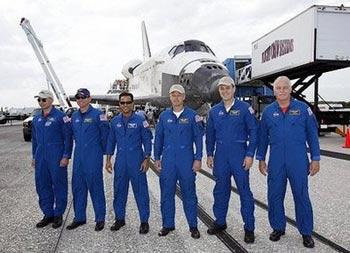 L-R: US space shuttle Discovery commander Lee Archambault, pilot Tony Antonelli, mission specialists Joseph Acaba, Steve Swanson, Richard Arnold and John Phillips after Discovery landed at Kennedy Space Center in Florida. The space shuttle Discovery and its crew of seven safely landed in Florida after completing its mission to install solar arrays aboard the orbiting International Space Station.(AFP/POOL/Terry Renna) 