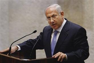 Israel's Prime Minister designate Benjamin Netanyahu, addresses the Knesset, Israel's Parliament, ahead of the swearing-in ceremony of his new government in Jerusalem, Tuesday, March 31, 2009. (AP Photo/David Silverman, Pool)