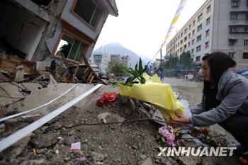 Most mourners brought incense, candles and bouquet to the ruins of former schools, homes and offices, shed tears, and spent a few hours with the deceased.