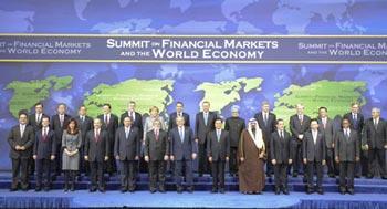 Chinese President Hu Jintao (5th R, front), U.S. President George W. Bush (6th R, front) and other leaders from the Group of Twenty (G20) members pose for a group photo during the G20 Summit on Financial Markets and the World Economy  in Washington, U.S., Nov. 15, 2008.(Xinhua/Li Xueren)