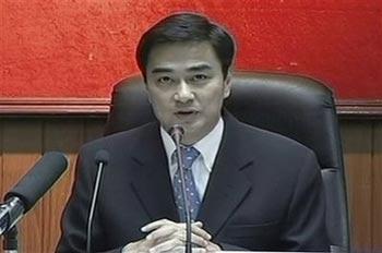 In this image taken from a TV footage, Thai Prime Minister Abhisit Vejjajiva delivers his speech on TV in Bangkok, Thailand Sunday, April 12, 2009. 'The government decided to impose the state of emergency because we want to return the country to normalcy,' Abhisit said on national television.(AP Photo/APTN) 