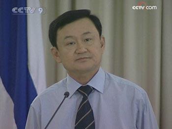 In a telephone message to his followers, Former Tai Prime Minister Thaksin Shinawatra called for a revolution and said he might return from exile to lead it.