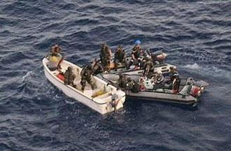 A picture released by the French Army shows French soldiers intercepting pirates off the coast of Kenya.(AFP/ECPAD)