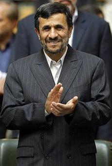 Iranian President Mahmoud Ahmadinejad applauds during the Iranian expatriates summit in Tehran on April 14, 2009. (AFP/File/Behrouz Mehri)