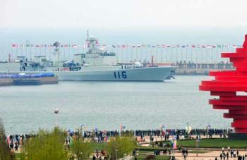 The Chinese People's Liberation Army (PLA) Navy's missile destroyer Shijiazhuang sets out for the sea to take part in the PLA naval fleet parade marking the 60th anniversary of the founding of the PLA Navy, in Qingdao, east China's Shandong Province, on April 23, 2009. (Xinhua/Li Ziheng)