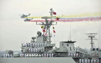 A naval parade of the Chinese People's Liberation Army (PLA) Navy warships and aircraft is held in waters off China's port city of Qingdao, east China's Shandong Province, on April 23, 2009. (Xinhua/Li Gang)