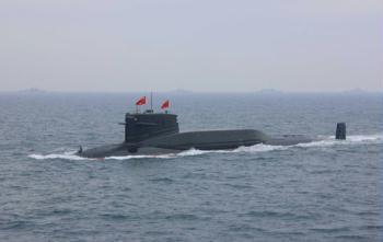 A nuclear-powered submarine of the Chinese People's Liberation Army (PLA) Navy is seen during a naval parade of the PLA Navy warships and aircraft in waters off Qingdao, east China's Shandong Province, on April 23, 2009. (Xinhua/Zha Chunming) 