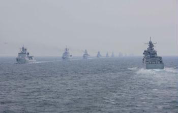 A naval parade of the Chinese People's Liberation Army Navy warships is held in waters off Qingdao, east China's Shandong Province, on April 23, 2009.(Xinhua/Zha Chunming)