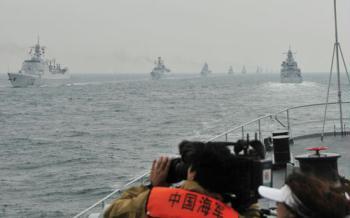 A fleet formation of the Chinese People's Liberation Army (PLA) Navy is seen during a naval parade of the PLA Navy warships and aircraft in waters off Qingdao, east China's Shandong Province, on April 23, 2009.  (Xinhua/Li Gang)