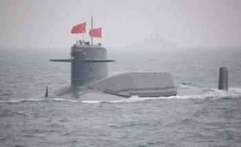 A nuclear submarine of the Chinese People's Liberation Army (PLA) Navy is seen during a naval parade of the PLA Navy warships and aircraft in waters off China's port city of Qingdao, east China's Shandong Province, on April 23, 2009. (Xinhua/Li Gang)