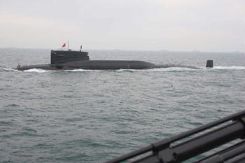 A nuclear submarine of the Chinese People's Liberation Army (PLA) Navy is seen during a naval parade of the PLA Navy warships and aircraft in waters off China's port city of Qingdao, east China's Shandong Province, on April 23, 2009. (Xinhua/Li Gang)