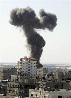 Smoke rises after Israeli warplanes launched a February 2009 strike on smuggling tunnels in Rafah. The tunnels link the southern Gaza Strip to Egypt. Israeli warplanes have launched strikes against two smuggling tunnels along Gaza's border with Egypt after militants fired a rocket at Israel.(AFP/File/Said Khatib) 