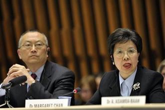 Keiji Fukuda, left, WHO Assistant Director General and China's Margaret Chan, right, Director General of the World Health Organization WHO, are seen during a press briefing to announce new developments on the swine influenza situation, at the World Health Organisation (WHO) headquarters in Geneva, Switzerland, Wednesday, April 29, 2009. (AP Photo/ Keystone, Martial Trezzini)
