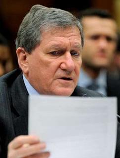 U.S. Special Representative for Afghanistan and Pakistan Richard Holbrooke glances at his notes as he testifies before a House Foreign Affairs Committee hearing on 'The Future of the US-Pakistan Relationship', on Capitol Hill in Washington, May 5, 2009.REUTERS/Mike Theiler