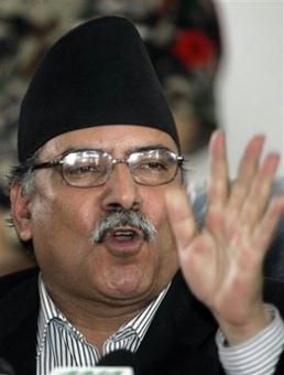 Nepal's former Prime Minister Pushpa Kamal Dahal speaks during a press conference in Katmandu, Nepal, Wednesday, May 6, 2009. Dahal, who resigned Monday in protest, told reporters Wednesday that his party would only join the new government if the president reversed his decision to block Dahal's attempts to fire the army chief.(AP Photo/ Gemunu Amarasinghe)