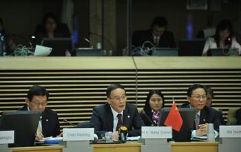 Chinese Vice Premier Wang Qishan (C), Chinese Minister of Commerce Chen Deming (L) and Minister of Finance Xie Xuren attend the Second China-European Union High Level Economic and Trade Dialog at the EU headquarters in Brussels, capital of Belgium, May 7, 2009. (Xinhua/Wu Wei)