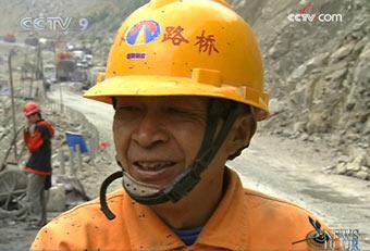 Fifty-eight-year-old Hu Changyun is well-known as Lao Hu, or old Hu, at the road construction site between Yingxiu and Wenchuan.