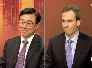 Huang Youyi, Vice president of China Int'l Publishing Group and William Hess, senior analyst & Country manager of Global Insight