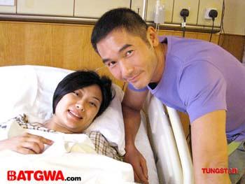 A Family photo of Alex Fong Hoyan Mok and their baby