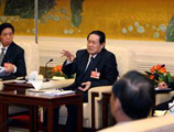 Zhou Yongkang: Economy needs judicial support
