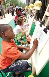 Children portray world expositions in the painting competition.