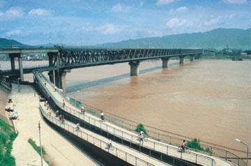 xijiang bridge opens to traffic in 1987.