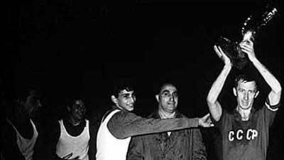 USSR captain Igor Netto (right) holds the Henri Delaunay trophy aloft (©Getty Images)