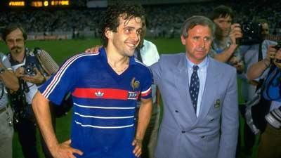 Michel Platini (left) and coach Michel Hidalgo celebrate their victory in 1984 (©Getty Images) 