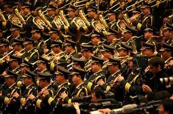 The military band of China's People's Liberation Army plays the national anthem during the First Session of the 11th National Committee of the Chinese People's Political Consultative Conference (CPPCC) at the Great Hall of the People in Beijing, capital of China, March 3, 2008. (Xinhua Photo)