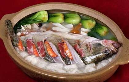 Fish, a homophone to the word "surplus" in Chinese, is one of the "suspicious foods" at the dinner table. It is a good omen to leave the bones, head and tail intact, symbolizing a good beginning and end in the coming year.