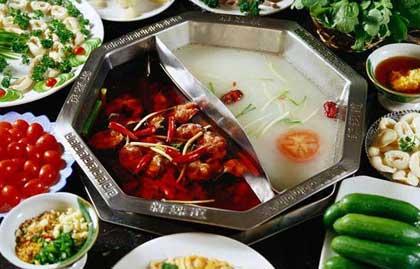 A steaming hot pot (or Chinese fondue) with meat, seafood and vegetables is a must, meaning prosperous and booming.