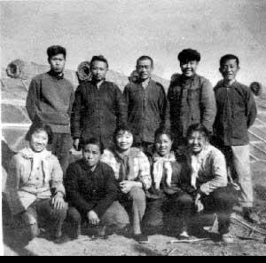This photo was taken shortly after my father and mother established a cooperative. The other people in this photo are the villagers who created the cooperative with them.