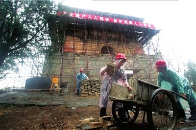 Emergency repairs on Maoling Tomb start despite rain