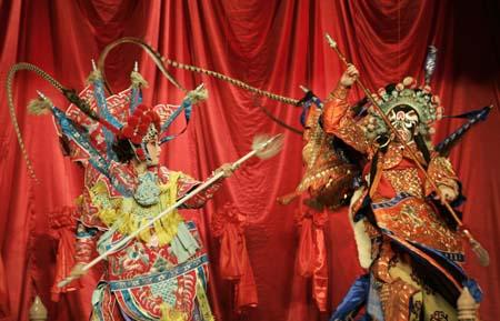 Beijing opera actors perform before a news conference for Chinese director Chen Kaige's production of Mei Lanfang in Beijing July 19, 2007. Veteran director Chen Kaige, best known in the West for 