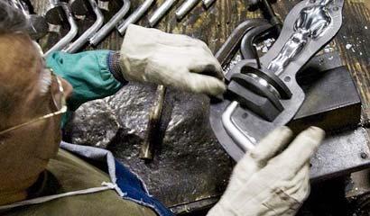 ...revealing the backside of an 8 1/2-pound pewter Oscar statuette(Picture: EPA)