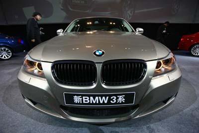 The model of BMW-Brilliance 3 Series is displayed at the launch ceremony in Beijing, China, on Dec. 8, 2008. The launch ceremony of BMW-Brilliance 3 Series including 320, 325 and 335, is held in Beijing on Monday. (Xinhua Photo)