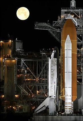 Space shuttle Discovery stands ready at pad39a in the early morning hours before a scheduled evening launch at Kennedy Space Center in Cape Canaveral, Fla., Wednesday, March 11, 2009. (AP Photo/John Raoux)