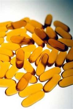 Vitamin E capsules are seen in this August 4, 2005 handout photo.[Agencies]